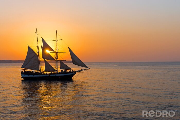 Fototapete Segelschiffs beim Sonnenuntergang