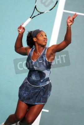 Fototapete Serena Williams schlägt den Ball auf