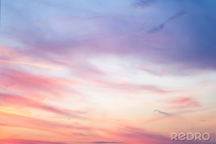 Fototapete Sky in the pink and blue colors. effect of light pastel colored of sunset cloudscloud on the sunset sky background with a pastel color