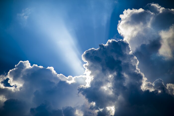 Fototapete Sonne in den Wolken