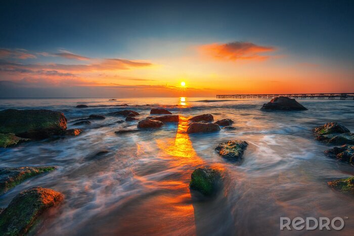 Fototapete Sonnenaufgang über dem Strand