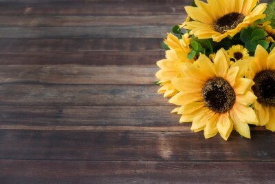 Fototapete Sonnenblumenstrauß auf Holz