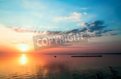 Fototapete Sonnenuntergang am ruhigen Wasser