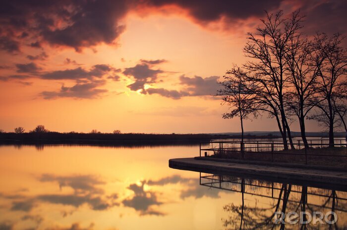 Fototapete Sonnenuntergang am stillen See