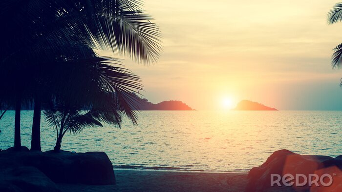 Fototapete Sonnenuntergang hinter Inseln