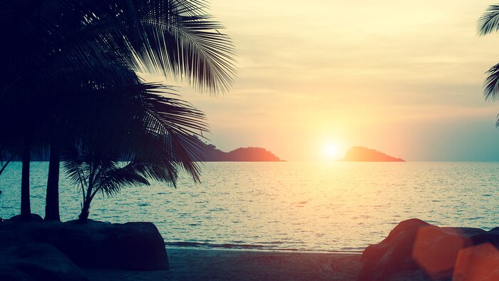 Fototapete Sonnenuntergang hinter Inseln