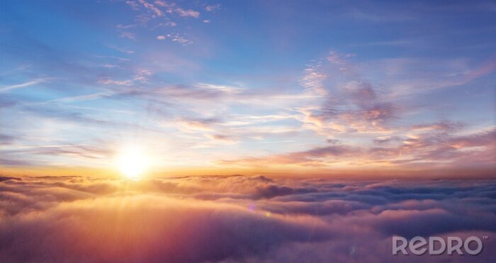 Fototapete Sonnenuntergang in den Wolken