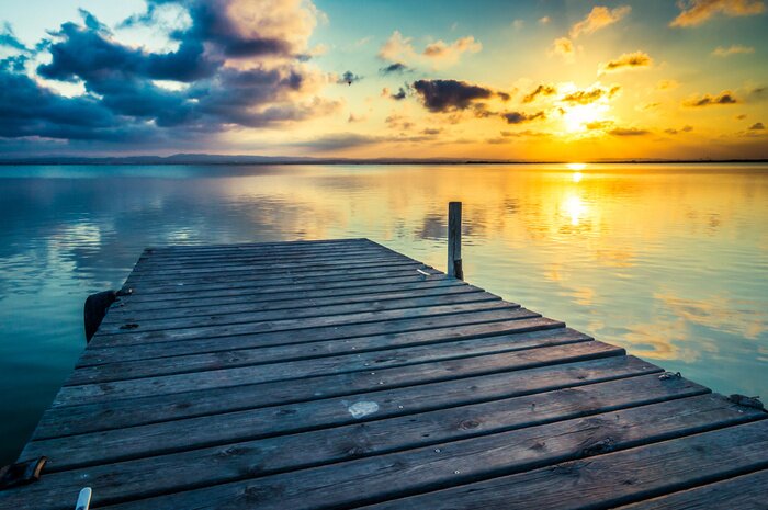 Fototapete Sonnenuntergang über kleiner Brücke