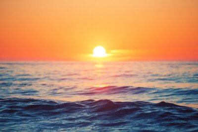 Fototapete Sonnenuntergang über Ozean und Wellen
