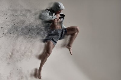 Fototapete Sportlicher Mann beim Springen