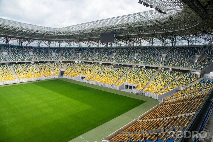 Fototapete Stadion mit gelben Stühlen