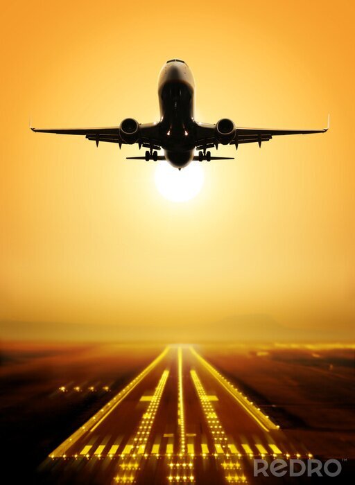 Fototapete Start eines Flugzeugs in der Sonne