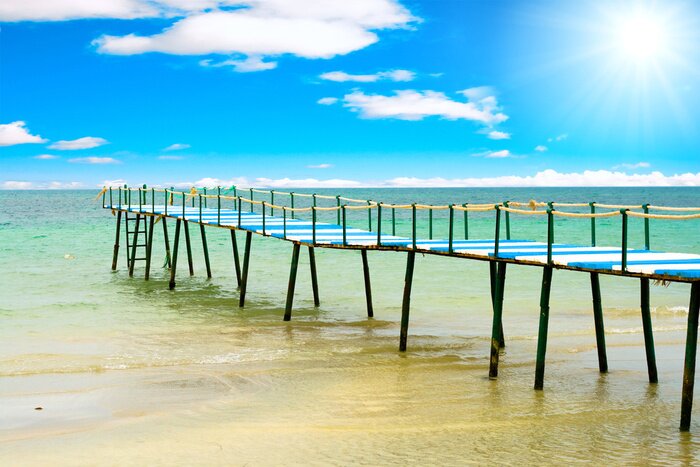 Fototapete Steg am seichter Stelle am Ufer