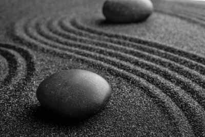 Fototapete Steine auf schwarzem Sand