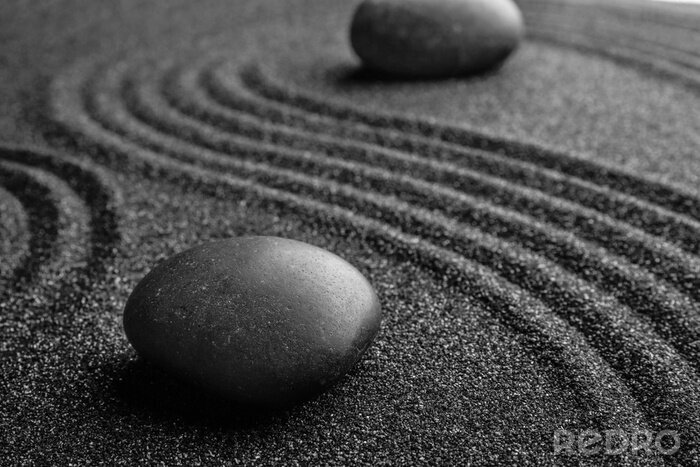Fototapete Steine auf schwarzem Sand