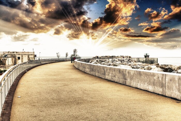 Fototapete Steinige Mole mit Leuchtturm