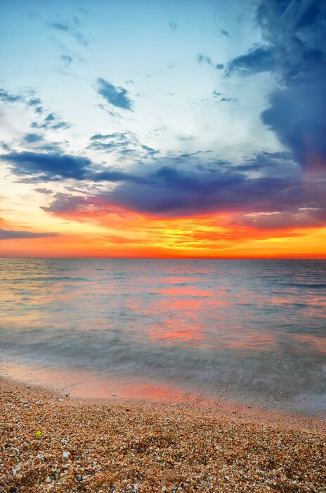 Fototapete Steinstrand am Ozean