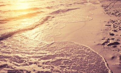 Fototapete Strand und Wellen in Sonnenstrahlen