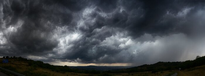 Fototapete Sturmwolken und dunkler Himmel