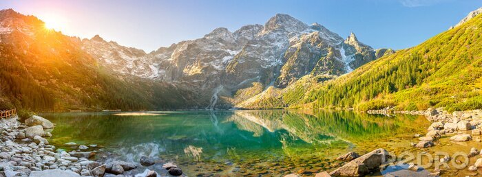 Fototapete Tatra National Park, a lake in the mountains at the dawn of the sun. Poland