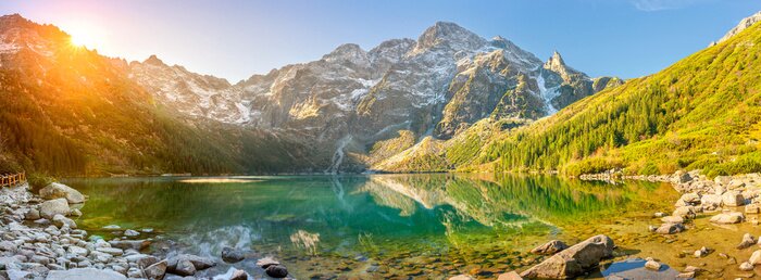 Fototapete Tatra National Park, a lake in the mountains at the dawn of the sun. Poland