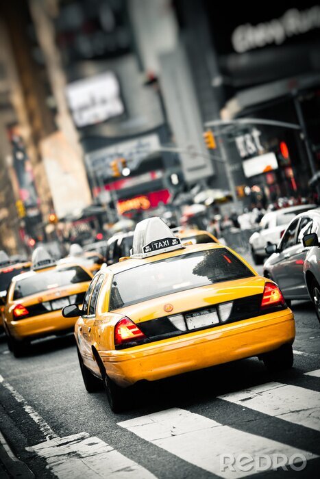 Fototapete Taxis Werbungen im Hintergrund