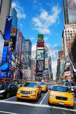 Fototapete Taxis zwischen bunten Gebäuden