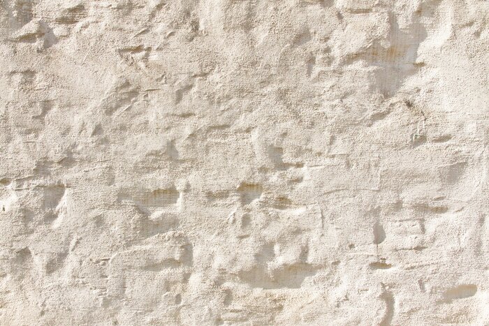 Fototapete Unebene helle Mauer