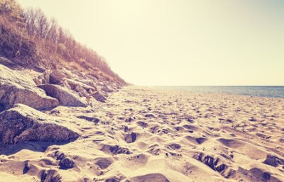 Fototapete Vintage getönten Bild von einem Strand bei Sonnenuntergang.