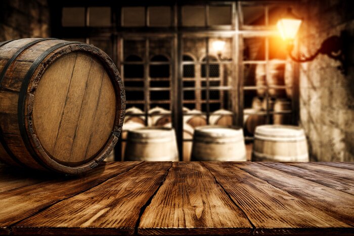 Fototapete Weinfass und Holztisch