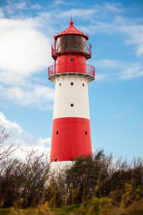 Fototapete Weiß-roter Leuchtturm mit Fensterchen