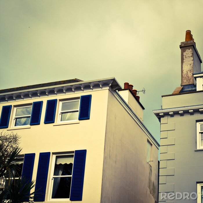 Fototapete Weißes Haus mit blauen Fensterläden