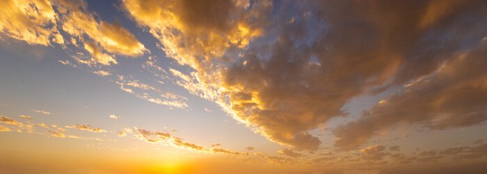 Fototapete Weite Sicht auf weiße Wolken