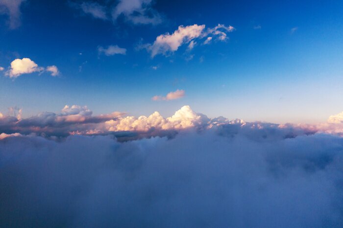 Fototapete Wolken bei Sonnenaufgang