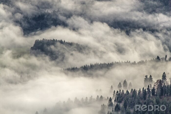 Fototapete Wolken in den Bergen
