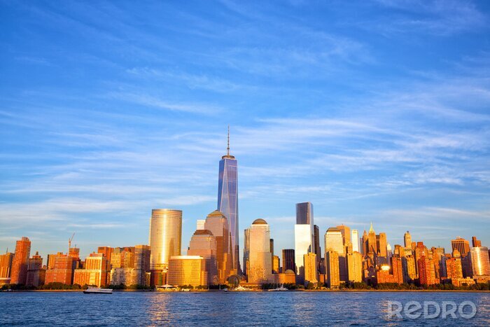 Fototapete Wolkenkratzer von Manhattan bei Sonnenuntergang