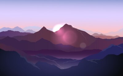 Aufgehende Sonne hinter den Bergsilhouetten