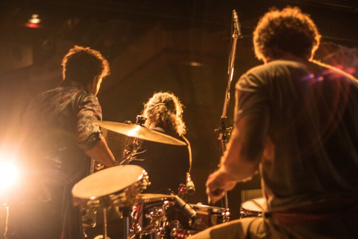 Poster Band bei einem Musikkonzert