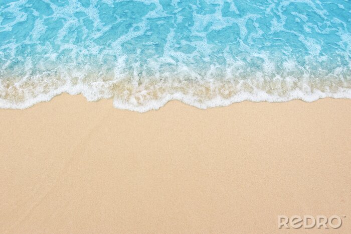 Poster Beautiful sandy beach and soft blue ocean wave