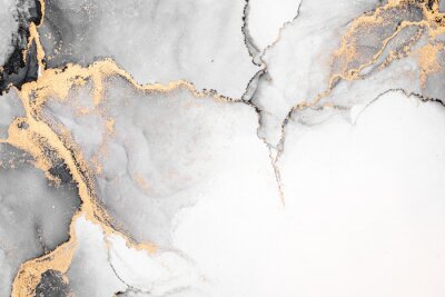 Black gold abstract background of marble liquid ink art painting on paper . Image of original artwork watercolor alcohol ink paint on high quality paper texture .