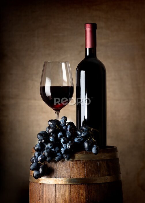 Poster Ein Glas und eine Flasche Rotwein
