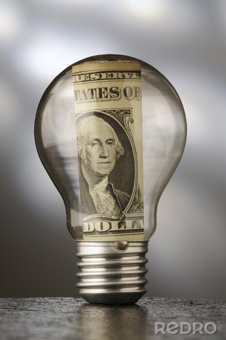 Poster Eine aufgerollte Dollar-Geldschein in einer Glühbirne