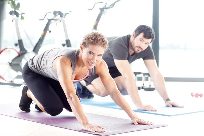 Poster Fitness Stretching auf einer Matte