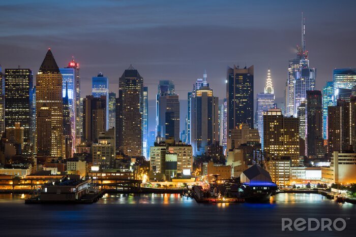 Poster Gebäude von New York City bei Nacht