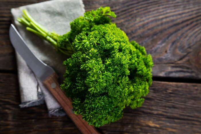 Poster Gemüse frische Petersilie in der Nähe des Messers