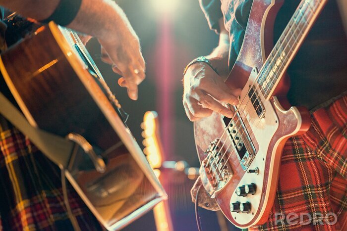 Poster Gitarrenspieler bei einem Rockkonzert