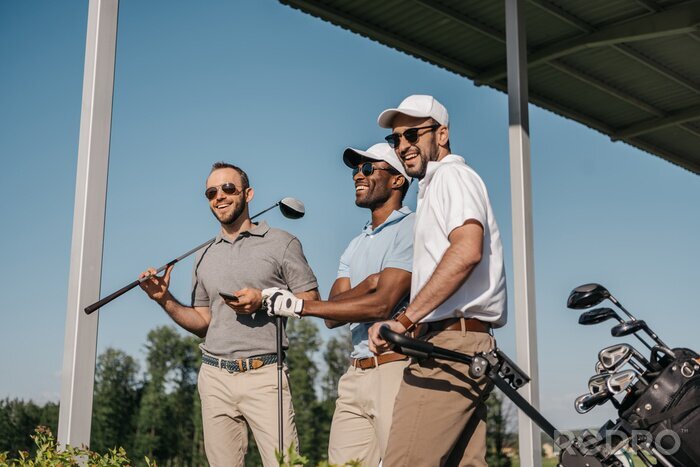 Poster Golfschläger und drei Spieler