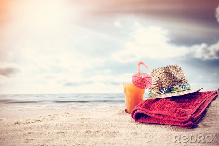 Poster Handtuch und Hut am Strand