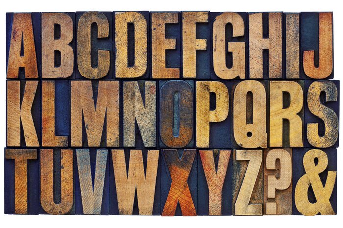 Poster Hölzernes Alphabet auf dunklem Hintergrund