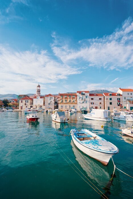 Poster Kastel coast in Dalmatia,Croatia. A famous tourist destination on the Adriatic sea. Fishing boats moored in old town harbor.